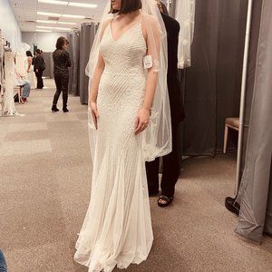 Glamorous, beaded wedding dress NWT